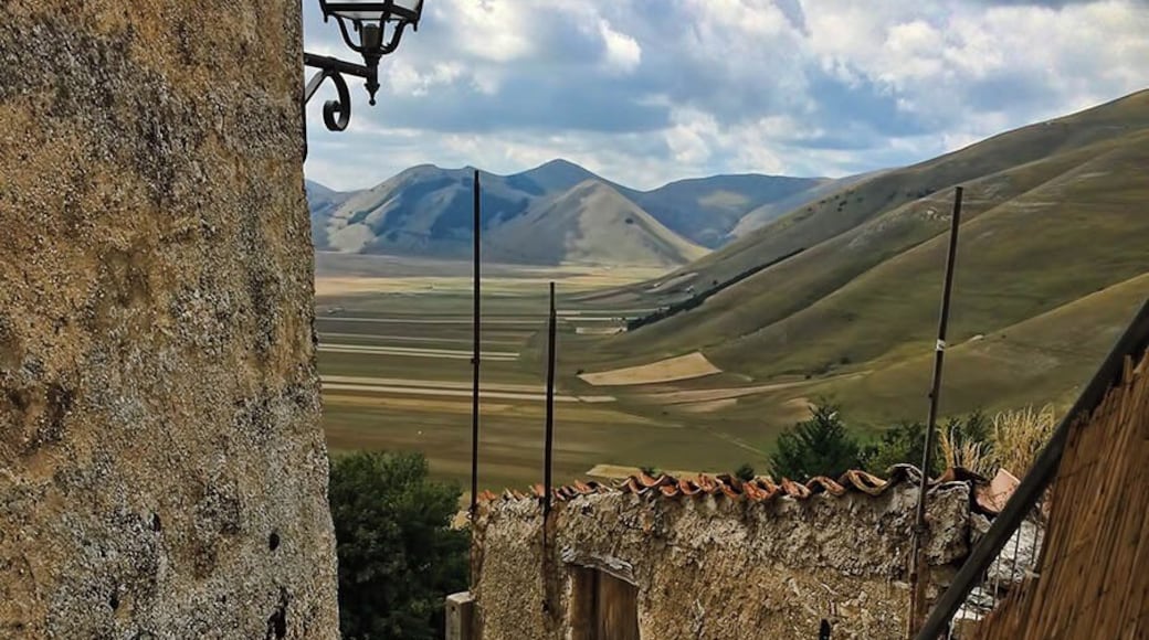 The drive to Castelluccio is itself famed and remarkable, but a visit to the small town at the end of the journey is a must (don't just turn around!)
It's a maze of twisty roads uphill, but taking the time to walk them means many hidden viewpoints to be discovered. It's quiet, very few tourists make it this far, and might even be worth a stay for a couple of days.