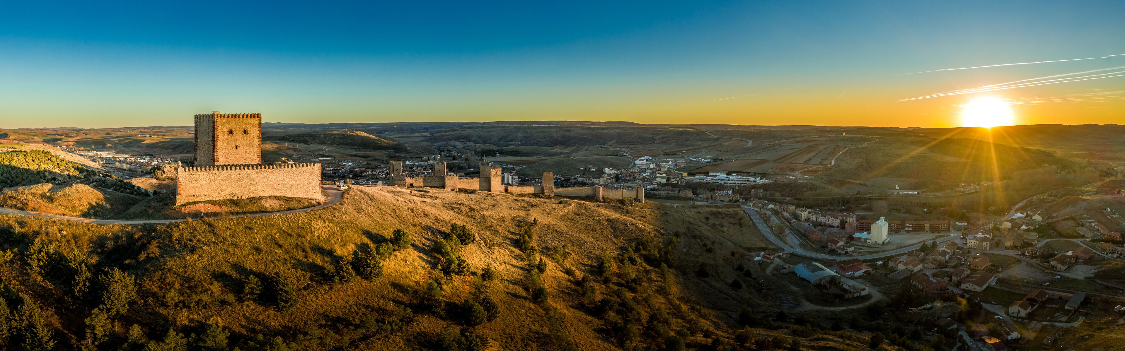 Molina de Aragon classic medieval Spanish ruined castle aerial panorama view at sunset close to Guadalajara Spain