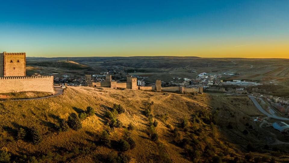 Molina de Aragon classic medieval Spanish ruined castle aerial panorama view at sunset close to Guadalajara Spain