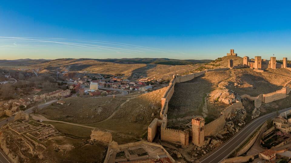 Molina de Aragon classic medieval Spanish ruined castle aerial panorama view at sunset close to Guadalajara Spain