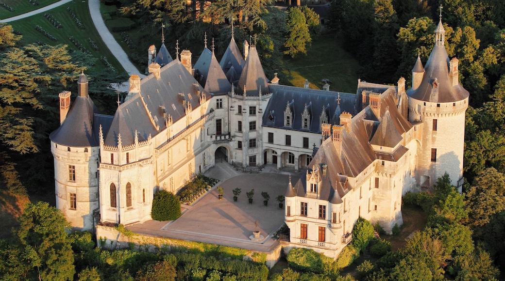 A large, historic castle with multiple towers and a central courtyard.