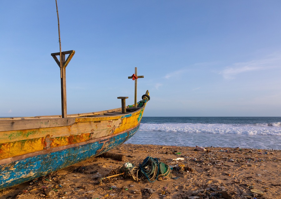Pirogues on the beach in N’zima fishermen village, Sud-Comoé, Grand-Bassam, Ivory Coast