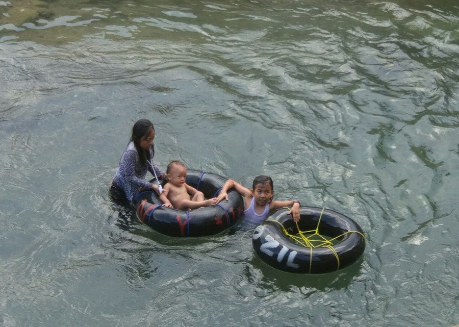 Children playing in the river in Bukit Lawang, North Sumatra