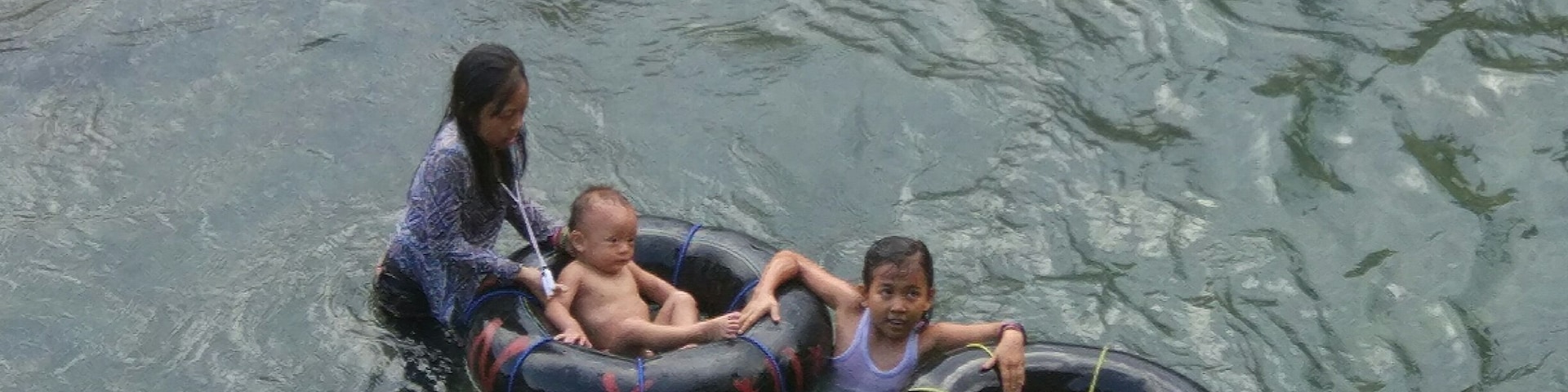 Children playing in the river in Bukit Lawang, North Sumatra