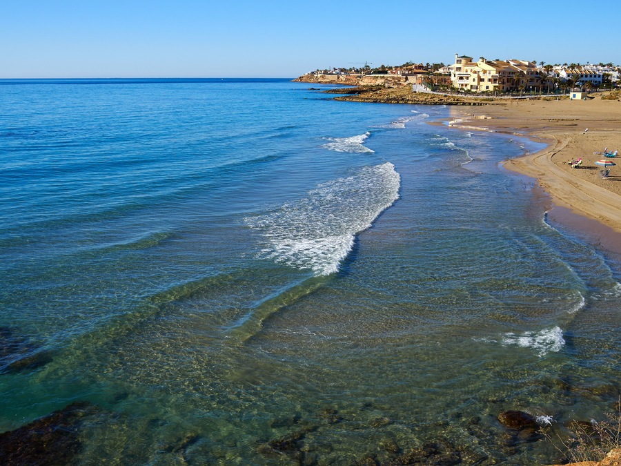 Popular great summer vacation travel destination La Zenia Beach Orihuela Costa South Spain; Shutterstock ID 1155248107; purchase_order: SP-1332 HA Batch 2 August 2018; Order: ; client: HomeAway; other