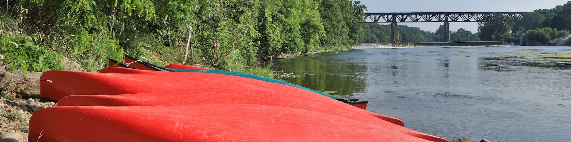 Grand River at Paris, Ontario, Canada with canoes in foreground