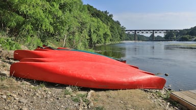 Grand River at Paris, Ontario, Canada with canoes in foreground