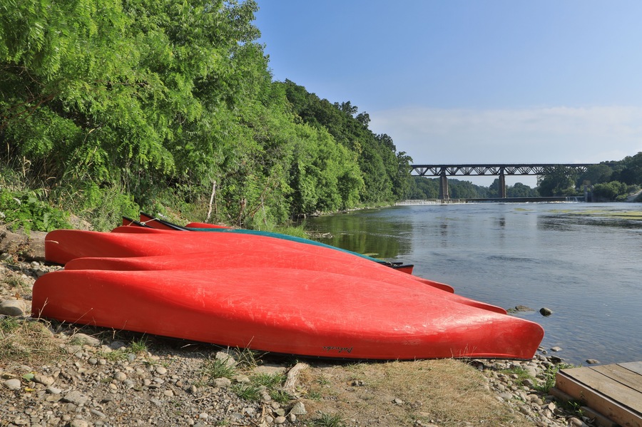 Grand River at Paris, Ontario, Canada with canoes in foreground