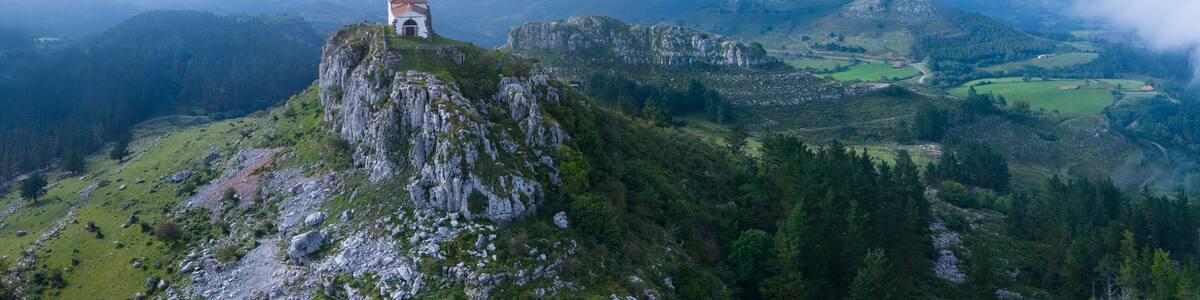Aerial view from a drone of the Hermitage of Our Lady of the Snows between Ampuero and the Guriezo Valley in the Asón-Agüera region. Cantabria, Spain. Europe