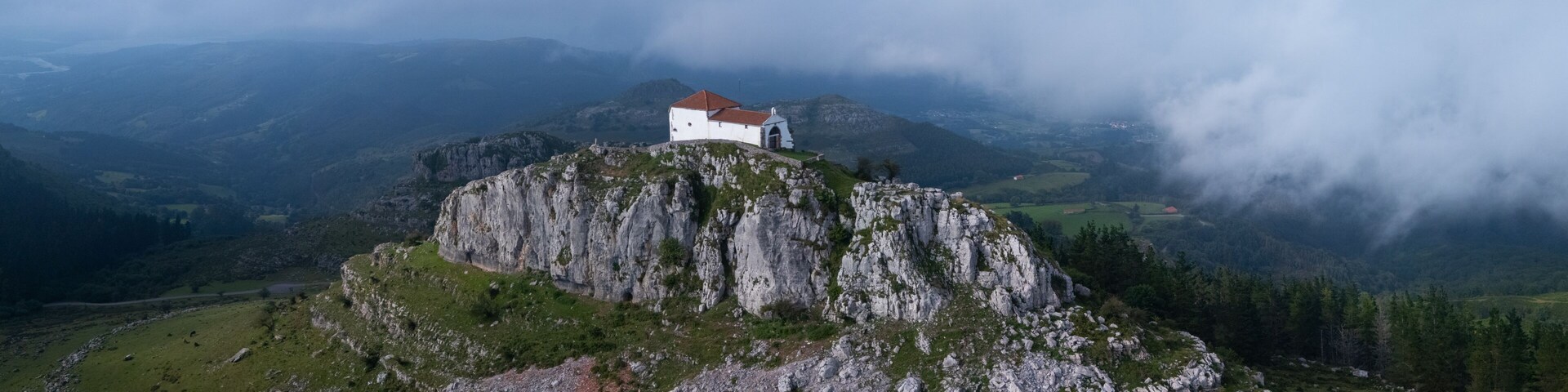 Aerial view from a drone of the Hermitage of Our Lady of the Snows between Ampuero and the Guriezo Valley in the Asón-Agüera region. Cantabria, Spain. Europe