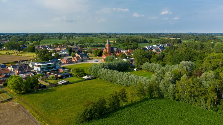Aerial view towards the village of Puivelde, in East Flanders, Belgium