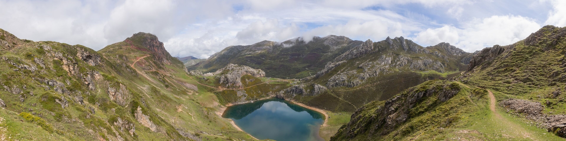 View of a lake from the top of the mountain in Somiedo, Spain