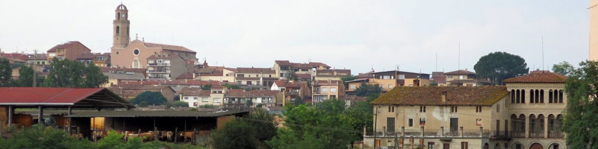 Sant Hipòlit de Voltregà des de la Gleva, amb l'església parroquial a mà esquerra