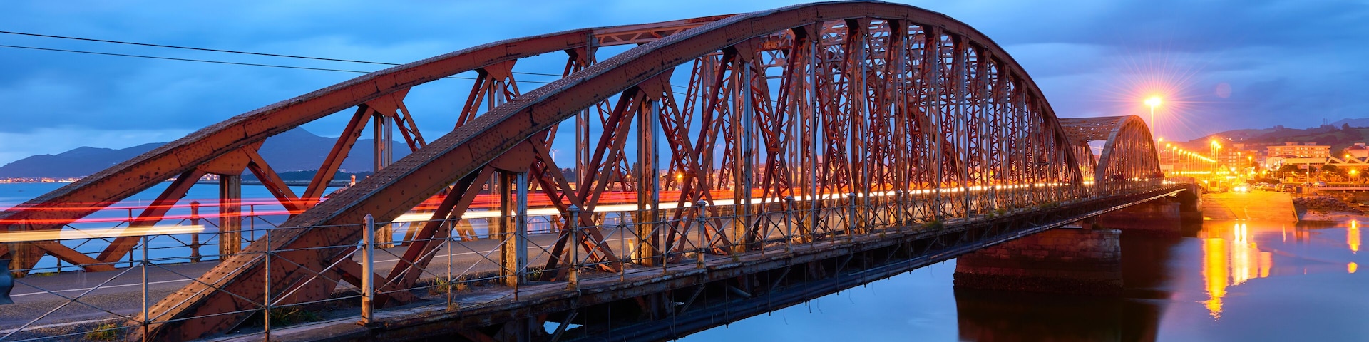Iron Bridge over the Ason river at evening, Colindres, Cantabria, Spain