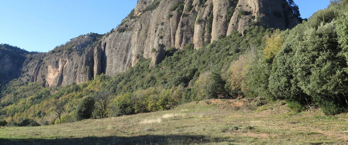 A rugged mountain with a clear sky.