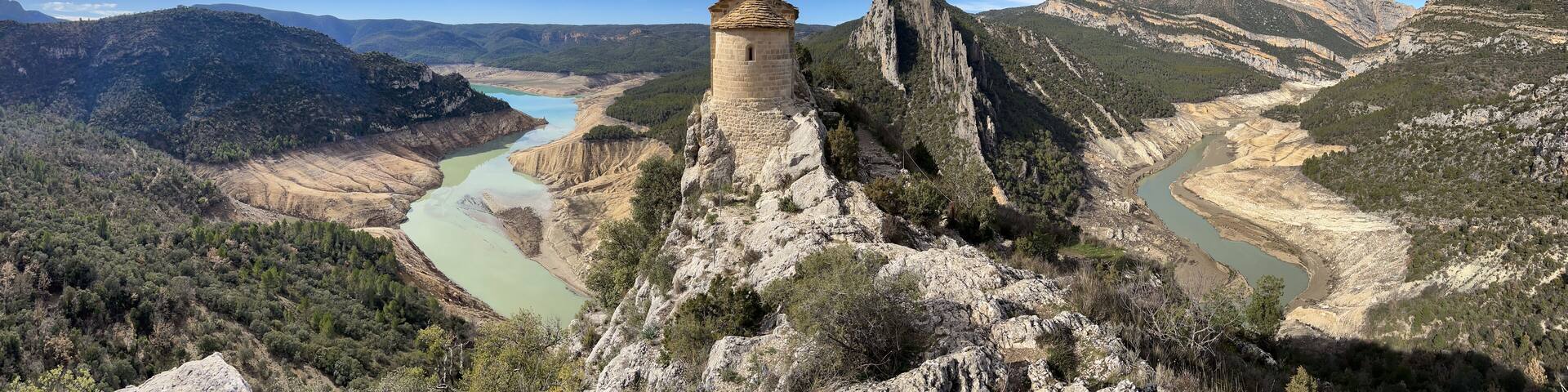 Ager hermitage overlooking dry reservoir in Catalonia, Spain