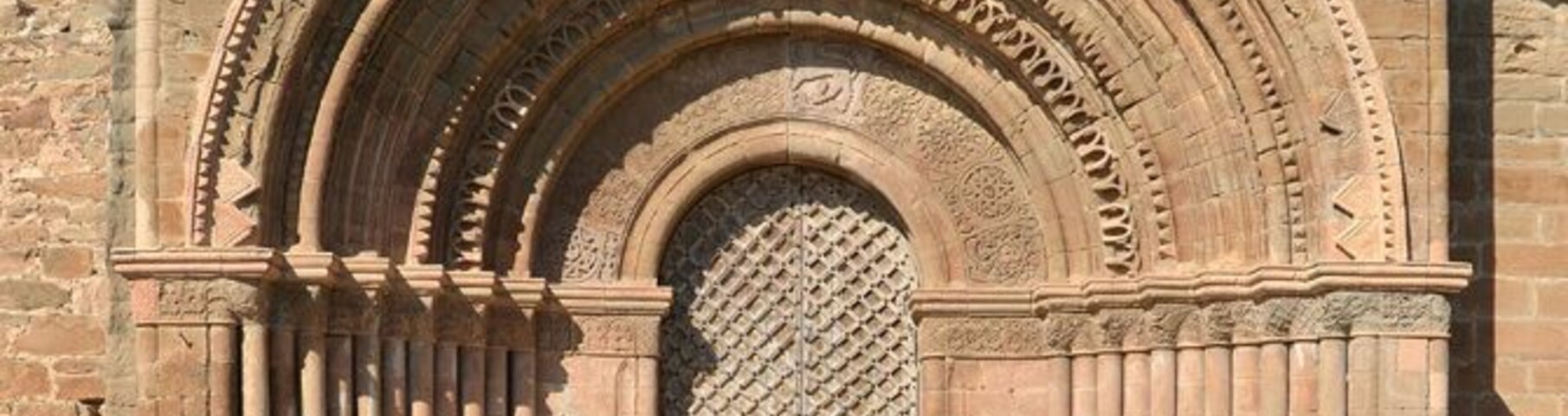 Cubells, la Noguera, Catalonia. Church of St. Mary the Castle. Romanesque door of School of Lleida, thirteenth century.