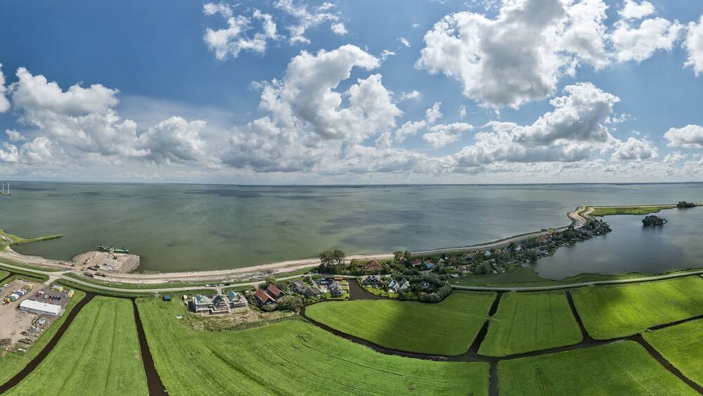Dutch dike levee for climate change adaptation to rising sea level