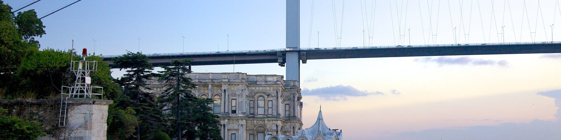 Beylerbeyi Palace which includes a bridge, general coastal views and heritage architecture