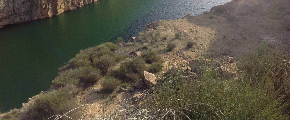 A canyon with a river.