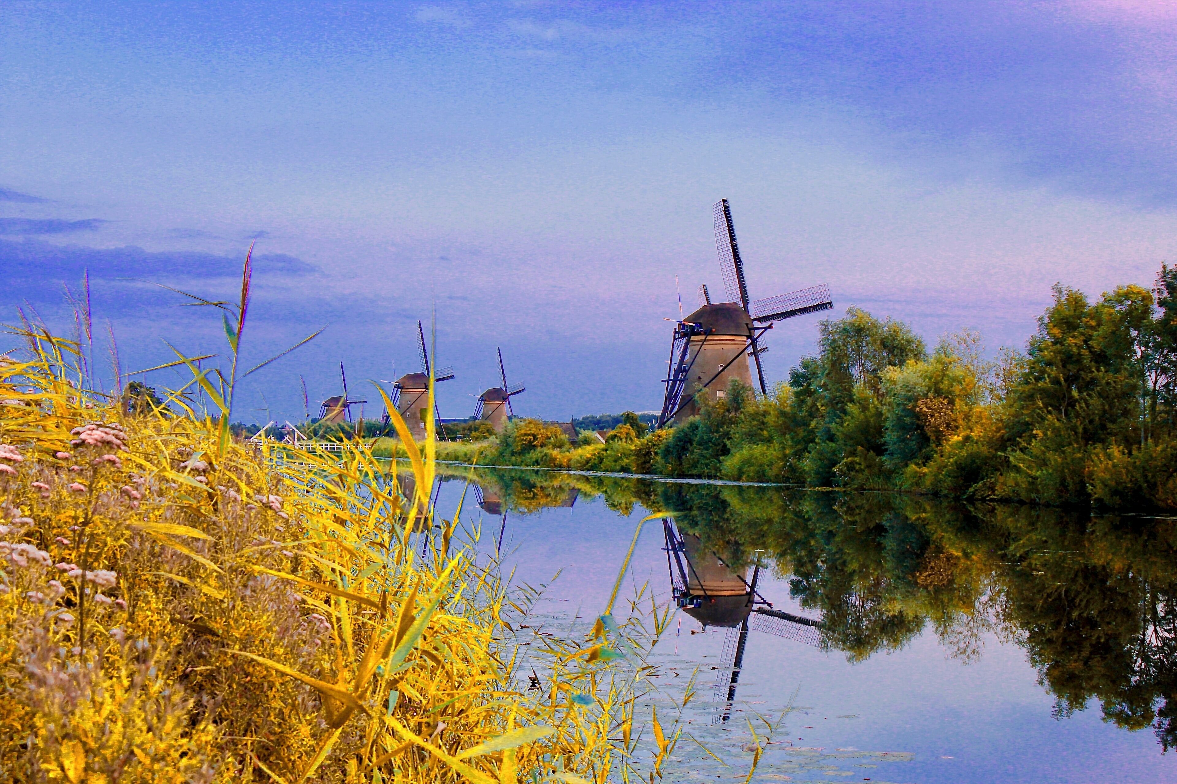 #BVSBlue
Checking out the dutch windmills just before sundown . I liked the reflection of it in the water with the blue sky.