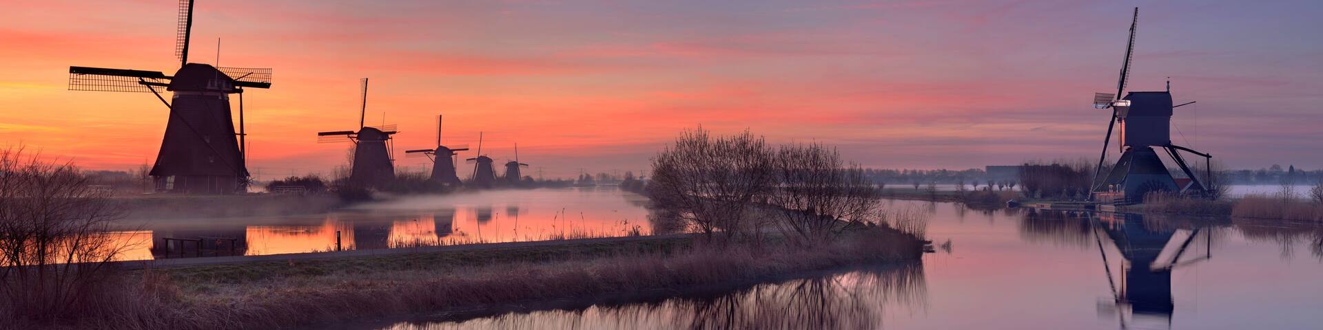 Traditional windmills at sunrise, Kinderdijk, The Netherlands