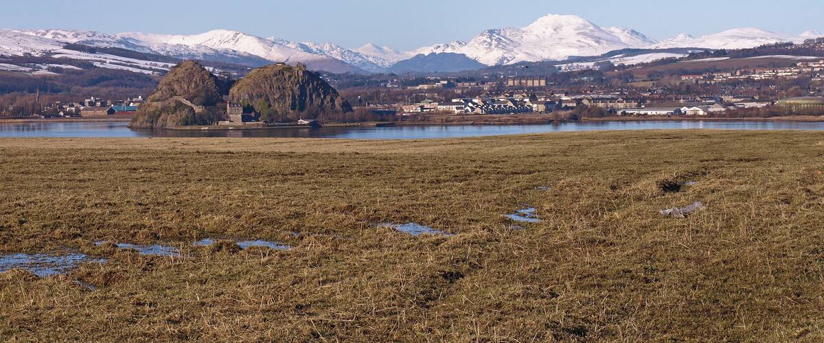 Field, High Hatton Farm View across the River Clyde to Dumbarton with Ben Lomond in the distance. Just below this field out of view are the M8,A8 and Glasgow/Greenock railway.