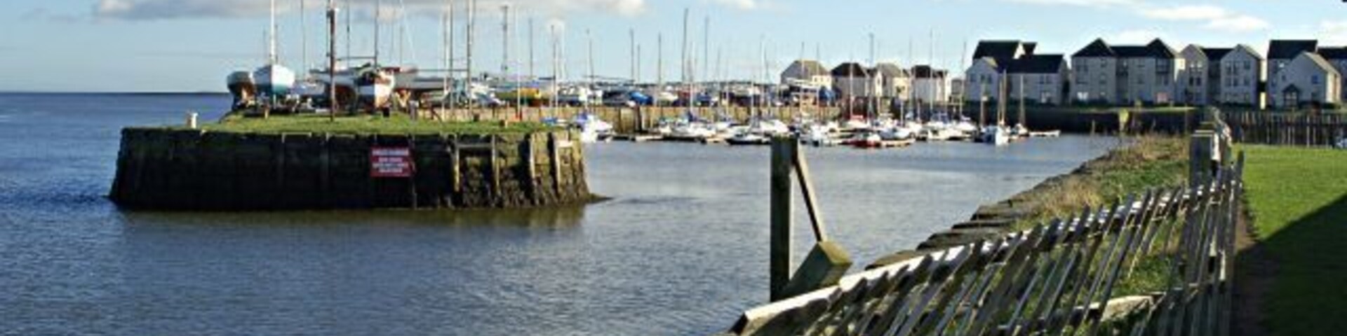 New Harbour Tayport Looking into the new harbour from the west and showing the new buildings at the Eastern end of the harbour.