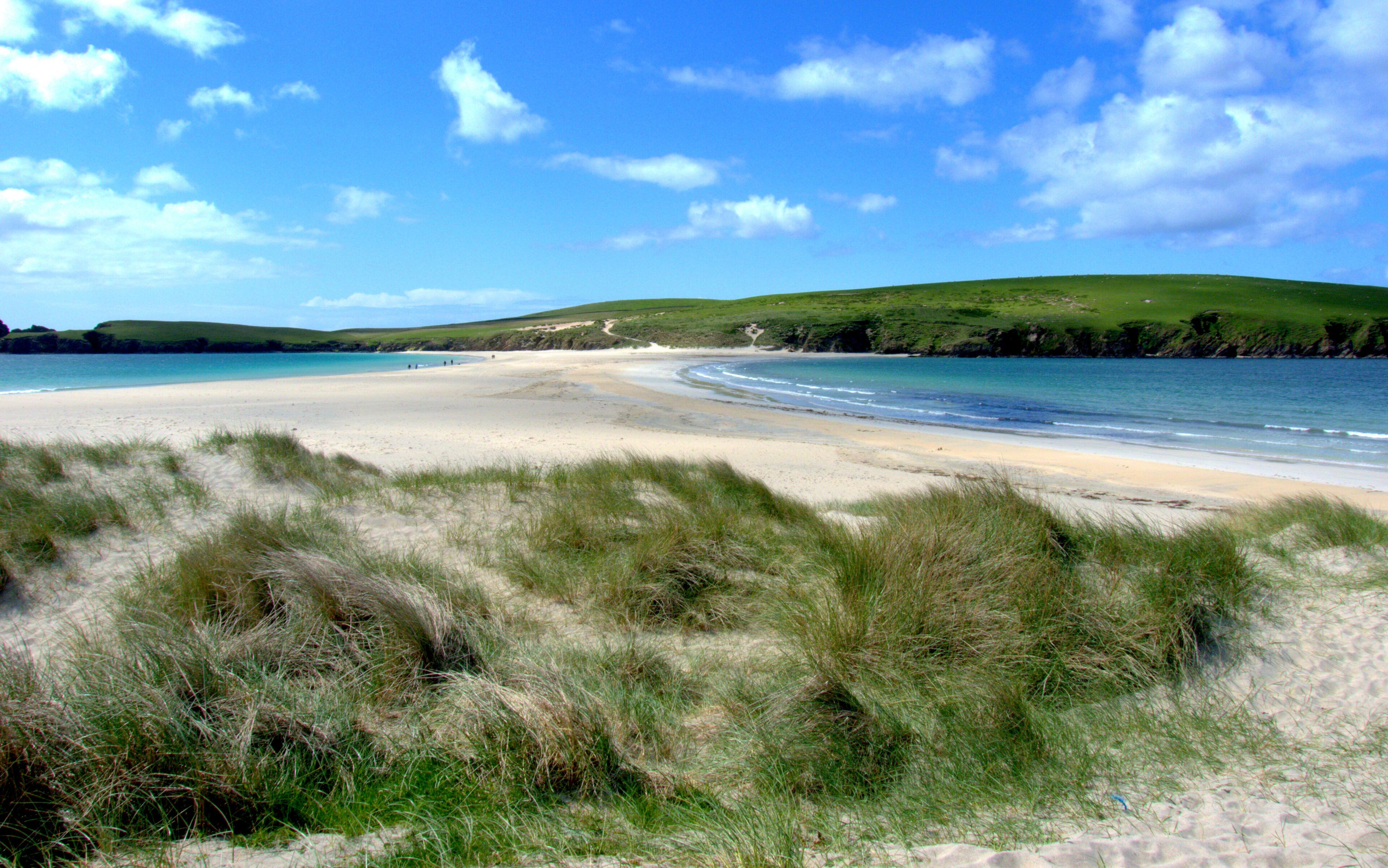 A view of the sand causeway across to St. Ninians Isle in the Shetlands.