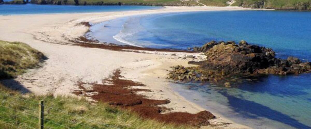 Tombolo at St Ninian's Isle In rough weather waves can break all the way across the tombolo.