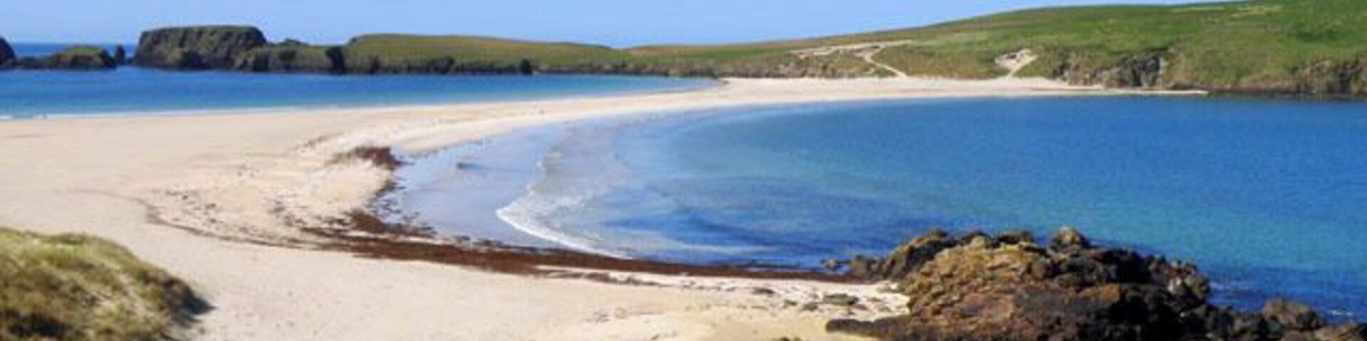 Tombolo at St Ninian's Isle In rough weather waves can break all the way across the tombolo.