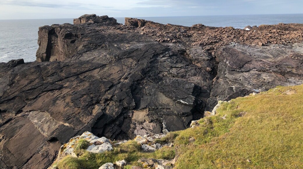 Boulders pulverized by the waves.