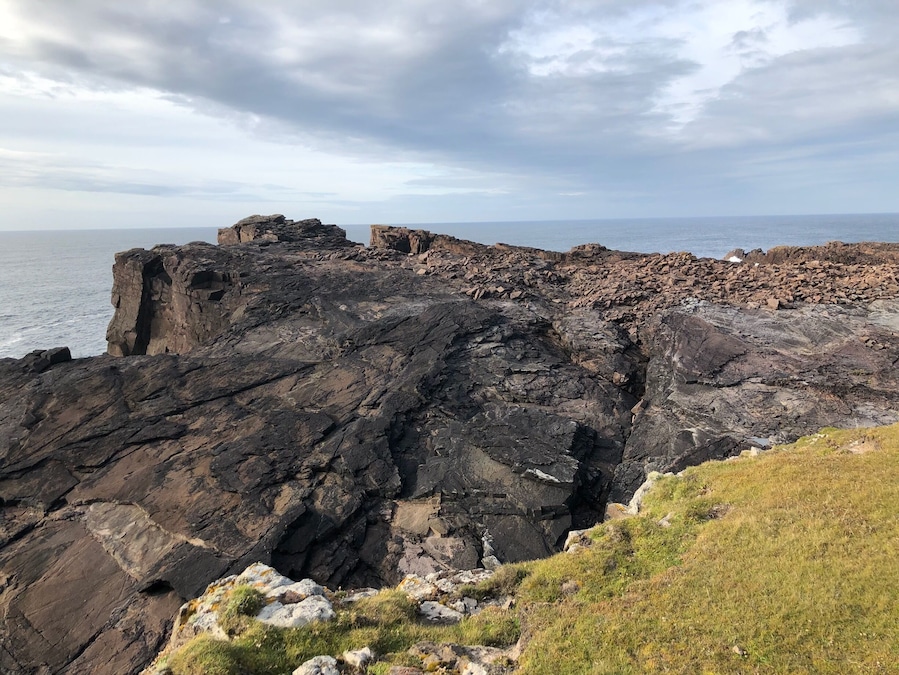 Boulders pulverized by the waves.
