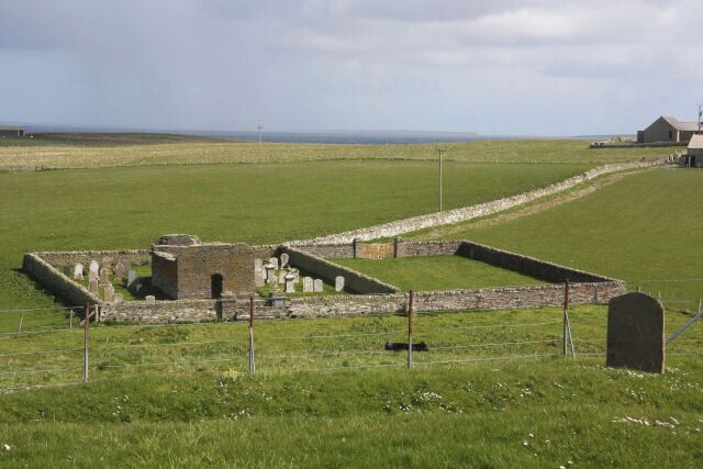 St Mary's Chapel, Wyre The ruined chapel and burial ground, viewed from the mound of Cubbie Roo's Castle.