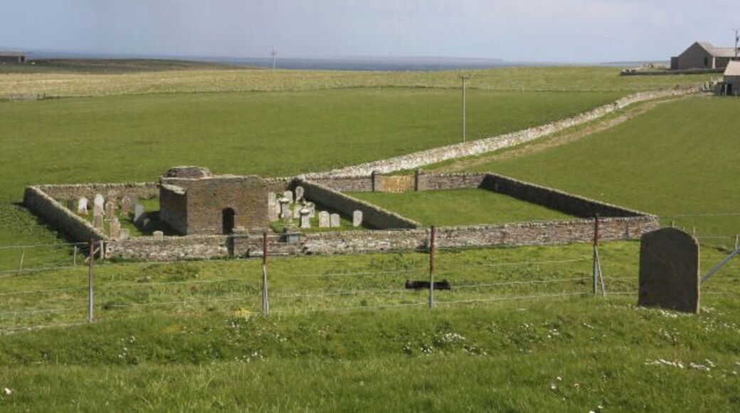 St Mary's Chapel, Wyre The ruined chapel and burial ground, viewed from the mound of Cubbie Roo's Castle.