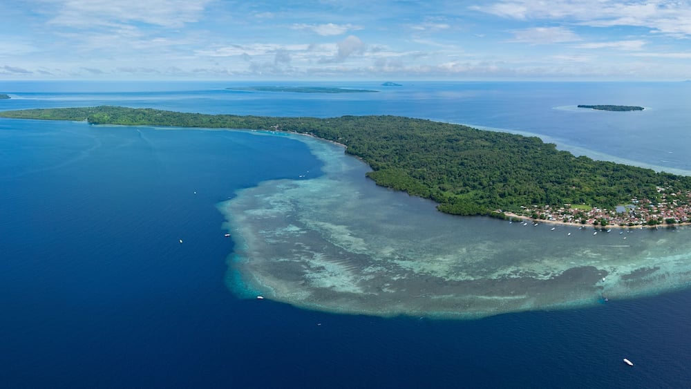 Beautiful coral reefs surround Bunaken National Marine Park near Manado in North Sulawesi, Indonesia. This tropical, scenic region harbors spectacular marine biodiversity.