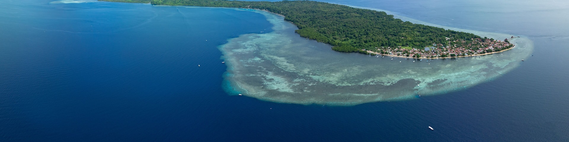 Beautiful coral reefs surround Bunaken National Marine Park near Manado in North Sulawesi, Indonesia. This tropical, scenic region harbors spectacular marine biodiversity.