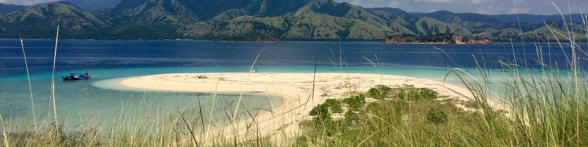 The green volcanic landscapes of the 17 islands national park, Riung, Indonesia. April is the best month to visit Indonesia, just at the end of the rainy season. #greeneverywhere #green #lifeatexpedia