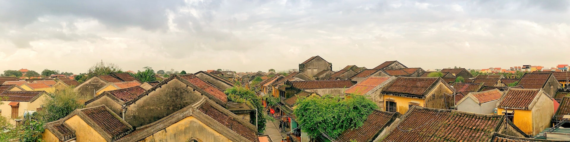 A densely packed historic town with traditional buildings and narrow streets.