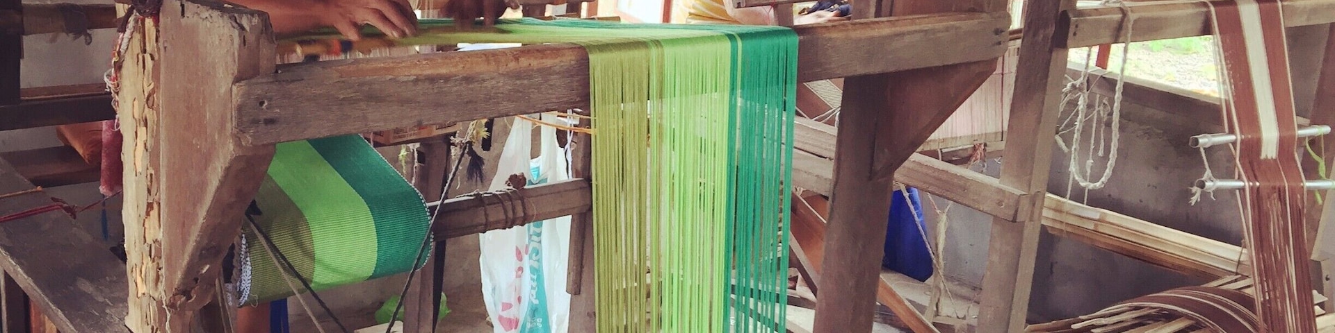 Loom Weaving, a method of doing blankets, towels and other clothing thats been passed down through generations.
My experience here is that i got to chat with these two "Lola" (a term used to address them as grandmother) on how long they've been doing this, after a chat i treated them for afternoon snacks. 
It was a humbling experience, and of course i bought some items to snug at night, my 2016, my #lifeatexpedia