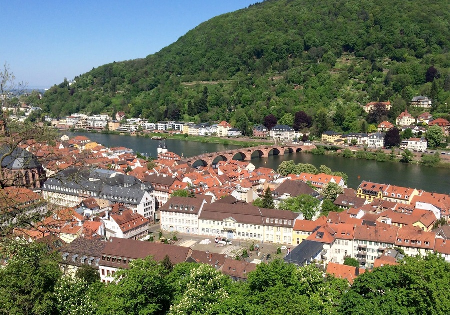 Welcome to Heidelberg ..
This charming German town was virtually untouched by WW II destruction. The only reported damage was the town bridge seen here. It was blown up in a small section by the German Army when they retreated from the invading western forces.
This view is from the Heidenberg Castle overlooking the Marketplace. The town has keep its old world charm with many restaurants and tourism type spots.