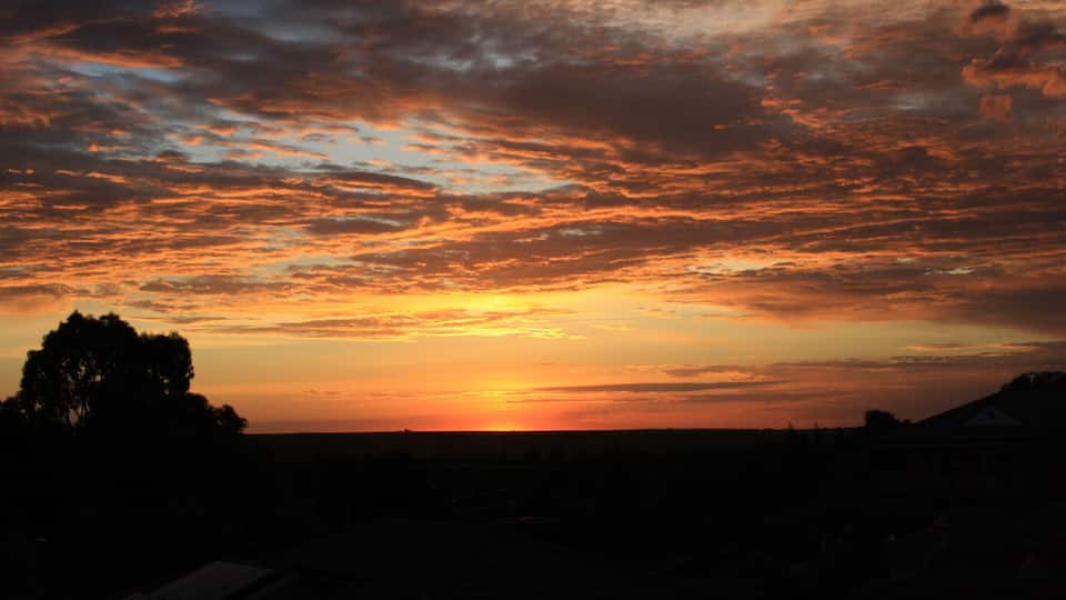 Sunrise in Darley near Bacchus Marsh, Victoria. To the east, but below the horizon is Melbourne 50km away.