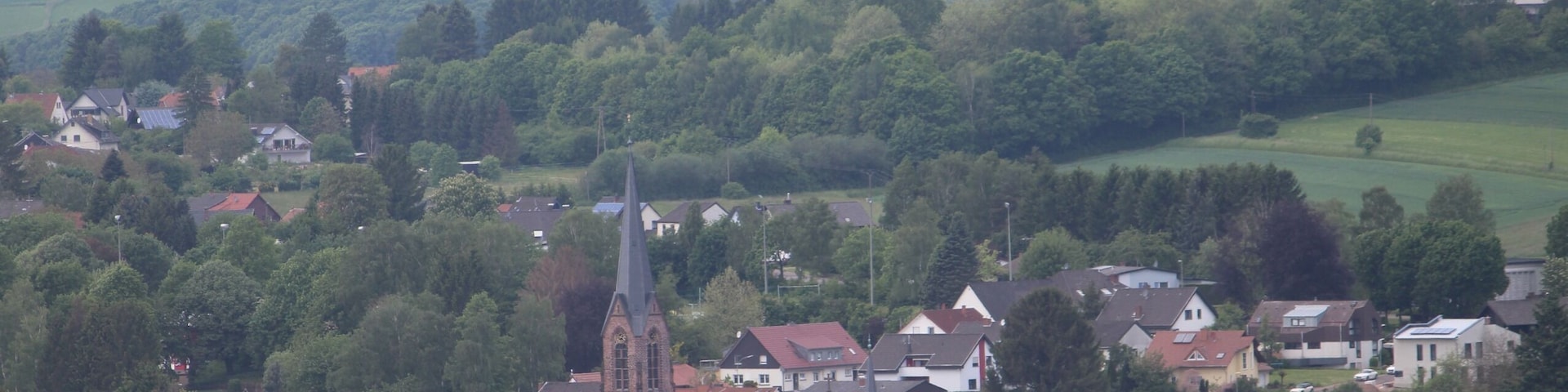 Heusweiler, view from farm Erdbeerland to the church of the Visitation