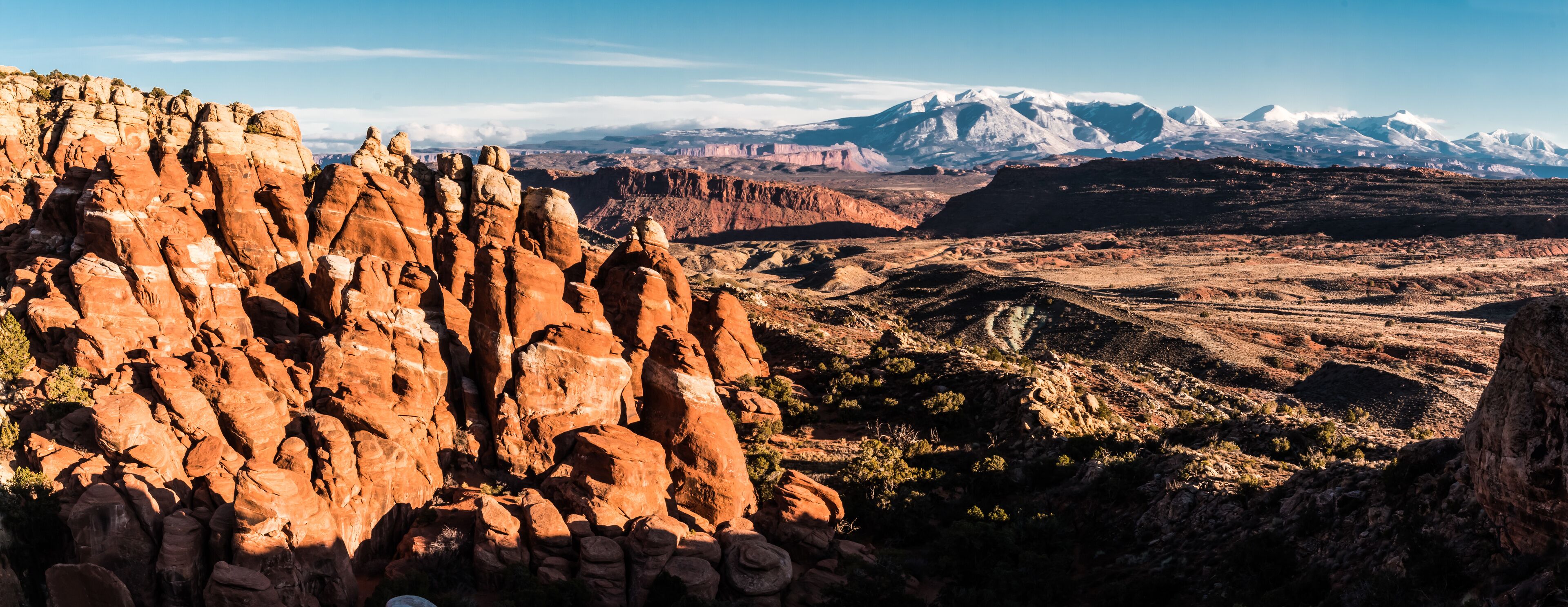 Fins of The Fiery Furnace and The Snow Capped La Sal Mountains, Arches National Park, Utah, USA
