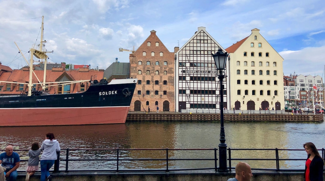 Beautiful street by the water in Gdansk, lined with boutique hotels and alleyways to incredible restaurants.