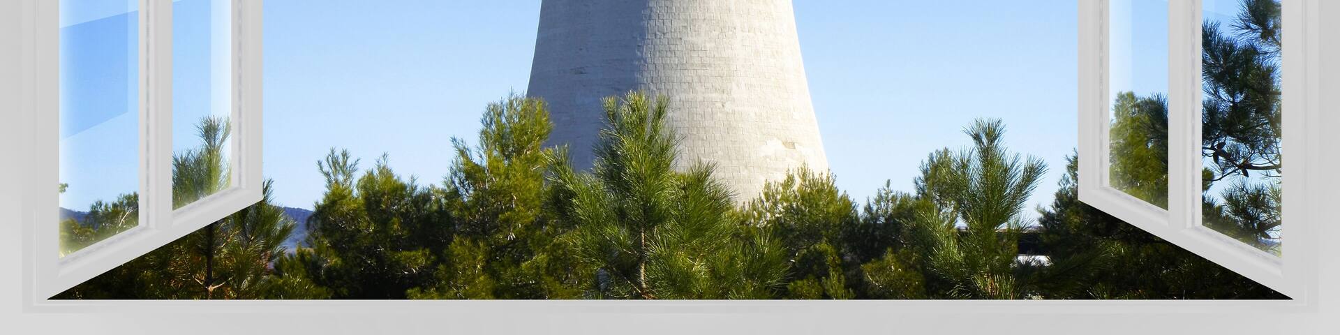 Geothermal power station in Tuscany hills with the concrete cooling towers (Italy) - concept image