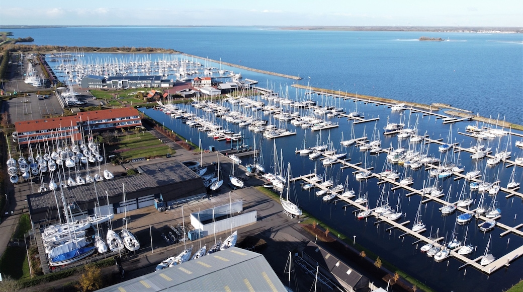 Harbor of Bruinisse in the Netherlands. Village in Schouwen-duiveland in the province of Zeeland. European fishing village with sailboats in the marina.