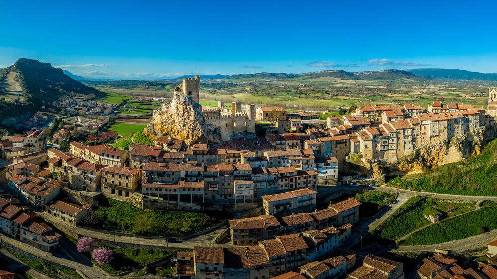 Frias aerial panorama of the medieval village with a castle and fortified bridge near Burgos in Castile and Leon Spain