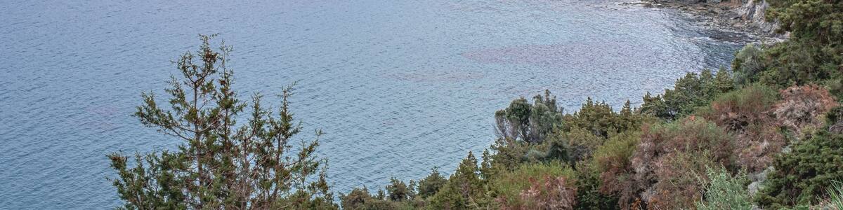 View of Chrysochou Bay coast as seen from Aphrodite Nature (Circular) Trail on Akamas Peninsula, above Neo Chorio and Latsi villages. Pafos district, Cyprus