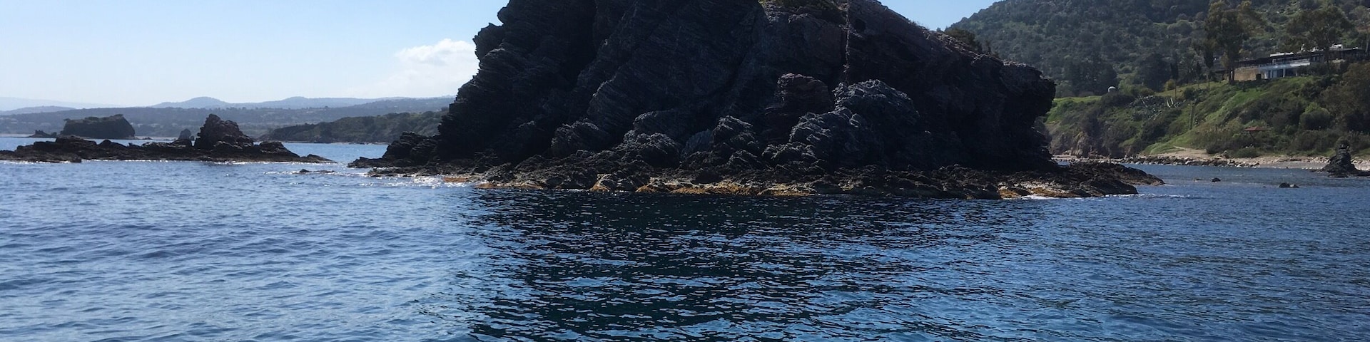 Aphrodite rocks from motor boat near neo chorizo